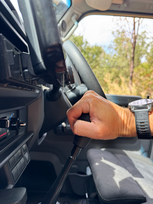 1.5 inch gear stick extension clearing a large floating touchscreen head unit in a 79 series Land Cruiser.
