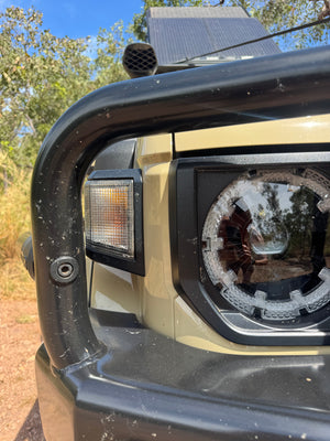 Clear front indicator lenses installed on our own 79 series dual cab cruiser for a clean aesthetic look