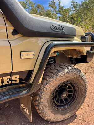 Plug and play clear side guard LED indicators installed on a 79 series dual cab Land Cruiser 