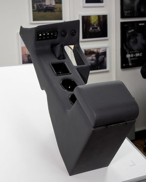 showroom view of Toyota LandCruiser 80 series vinyl centre console with cup holders on display in department of the interior show room 