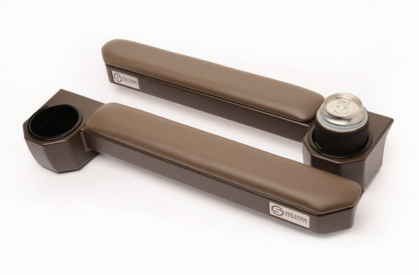 Pair of brown landcruiser armrests with cup holders for cans, bottles