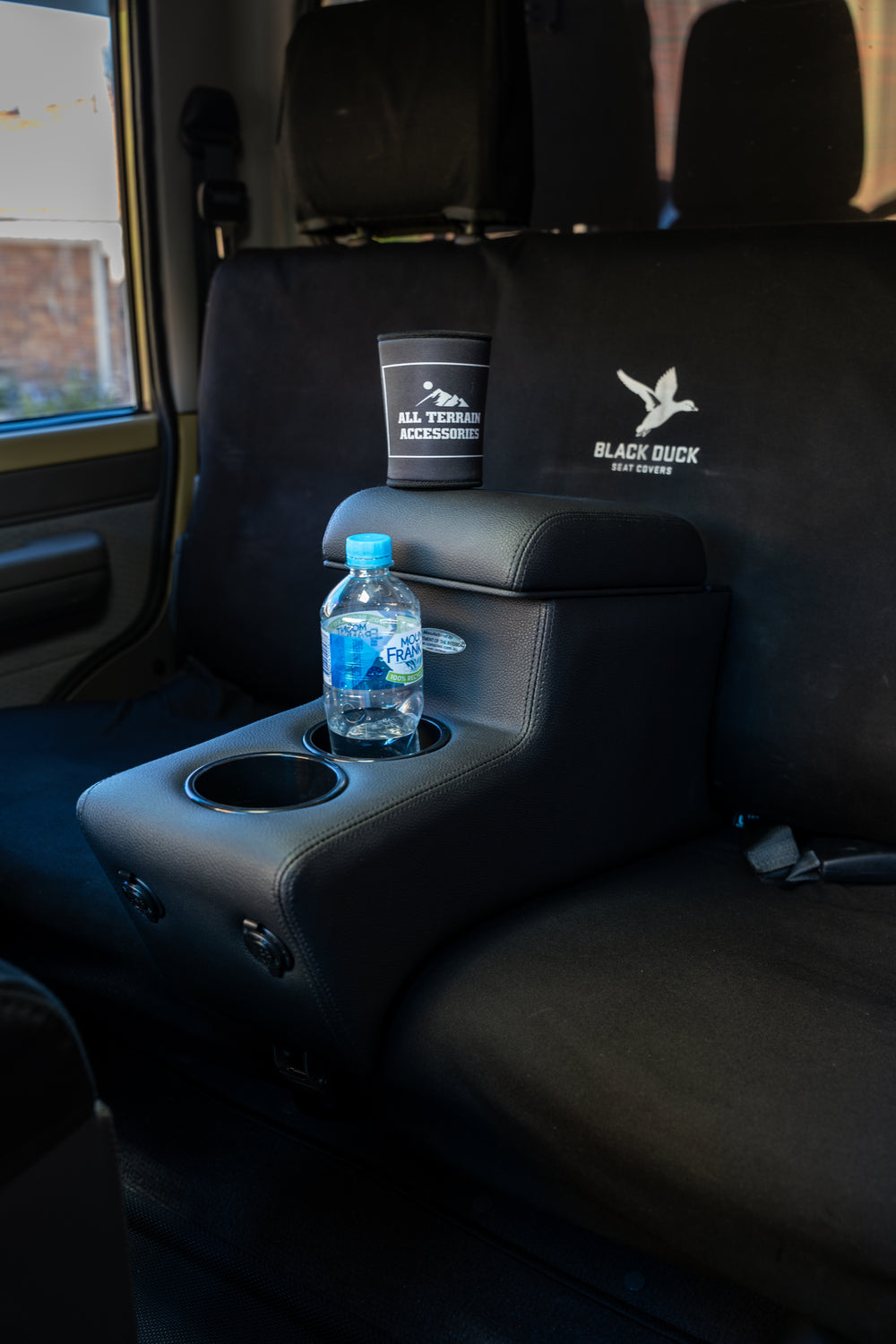 Installed Seat mate in dual cab 79 series black with RECAROs