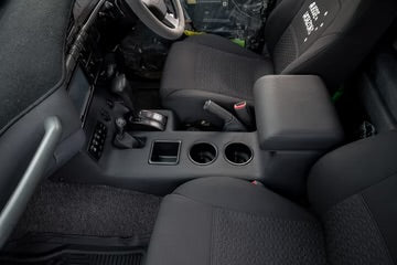 close up of 80 series interior with department of the interior aftermarket full length centre console 