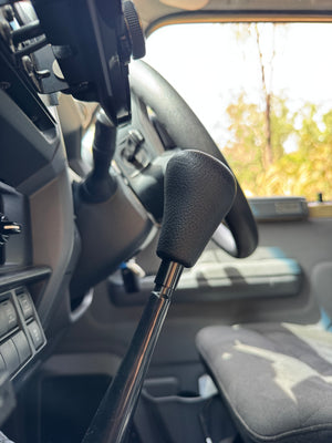 Installed gear stick extension displaying height of 1.5 inch over 2 inch gearstick extension for Landcruiser 
