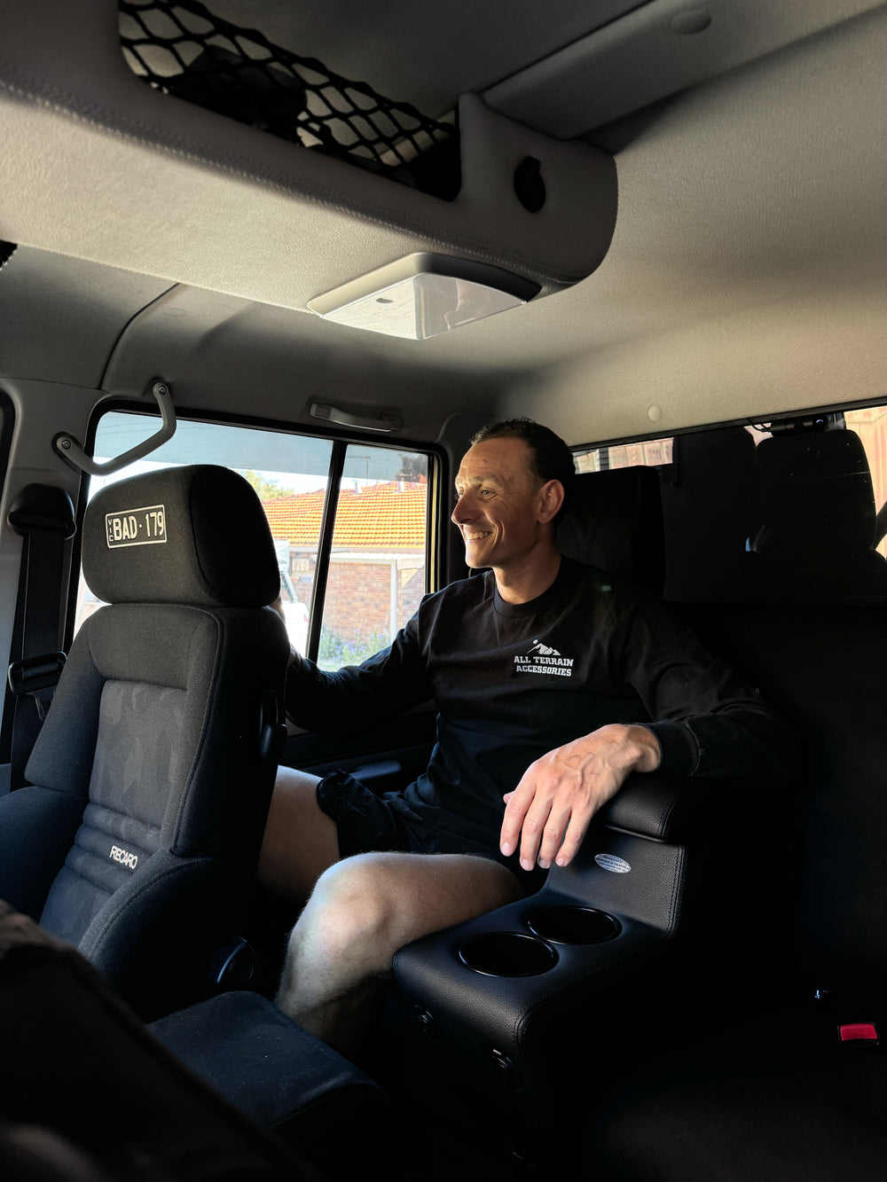Installed Seat mate in dual cab 79 series black with RECAROs