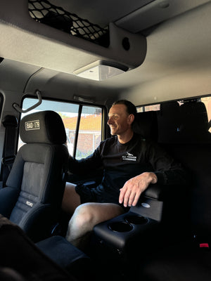 Installed Seat mate in dual cab 79 series black with RECAROs