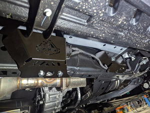 view of trig point wiring and ecu protection plates installed in black