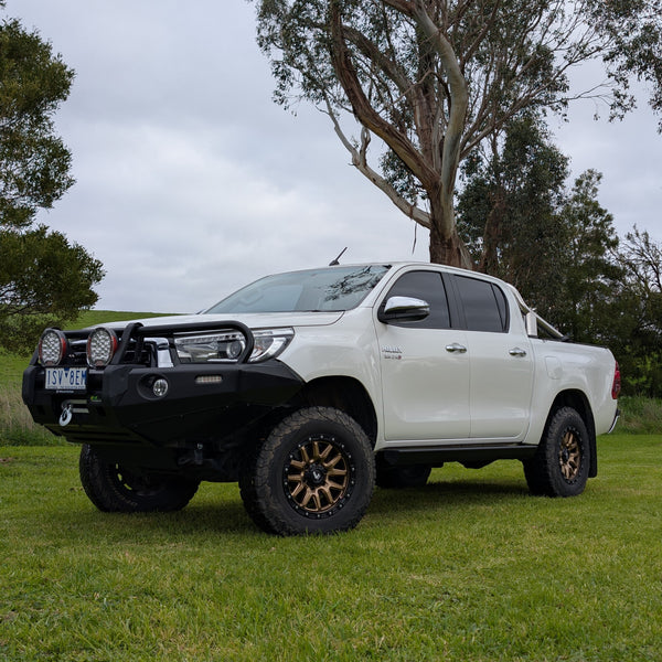 tough 4wd Toyota HiLux for Australian touring fitted with Trig Point side step sliders