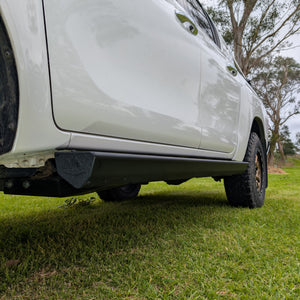 black powder coated side step sliders integrated into Toyota hilux n80 n90