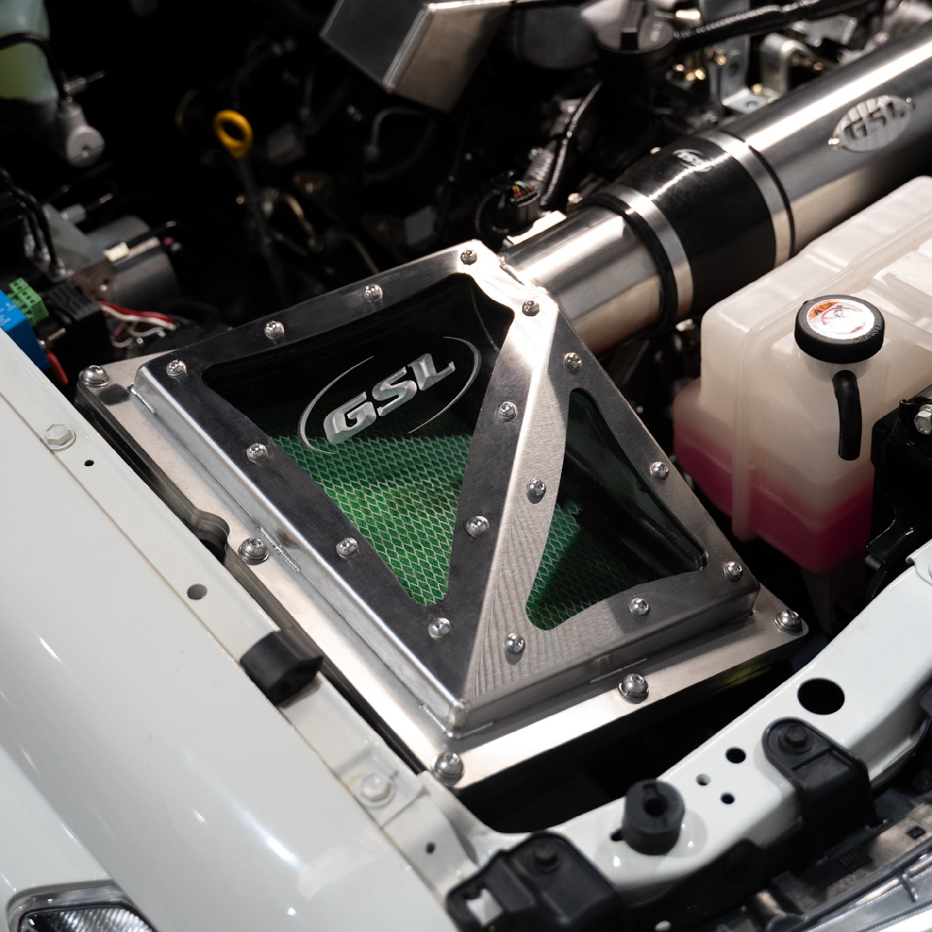 Brushed Stainless GSL Fab airbox on white 79 series dual cab