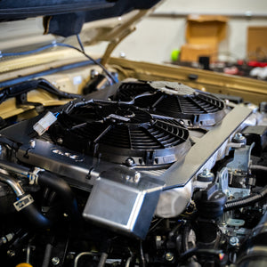 Twin high-performance SPAL thermo fans installed on 79 series sandy taupe LandCruiser 